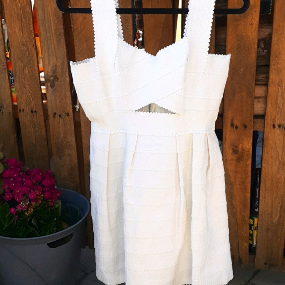 Hot and delicious White Elastic Band mini dress.